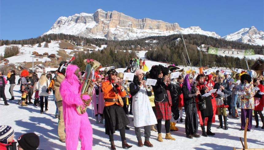 Carnival party on the snow in Alta Badia, Dolomites, Italy