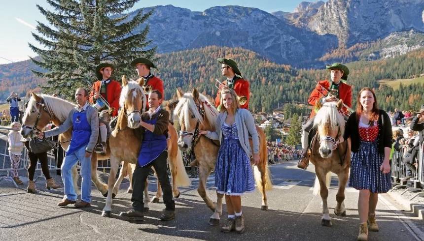 ​Leonardiritt - Parade with horses and traditional costumes on 6th November in Badia,St. Linert in the Dolomites, South Tyrol, Italy